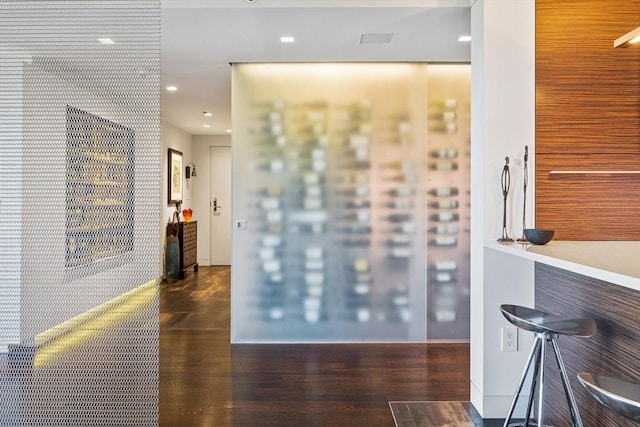 hallway featuring recessed lighting and wood finished floors