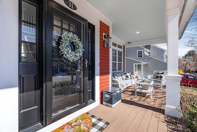 wooden terrace with a porch