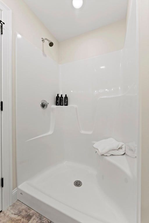 bathroom with walk in shower