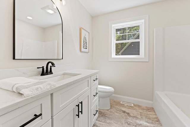 bathroom with vanity and toilet