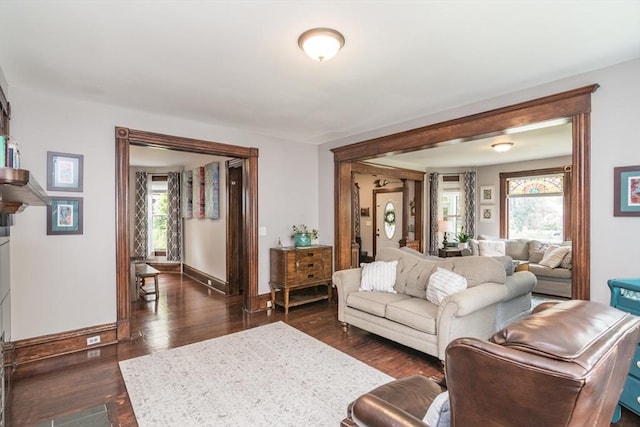 61 Fairfield Ave, Holyoke, MA 01040 - living room with dark wood-style floors and baseboards