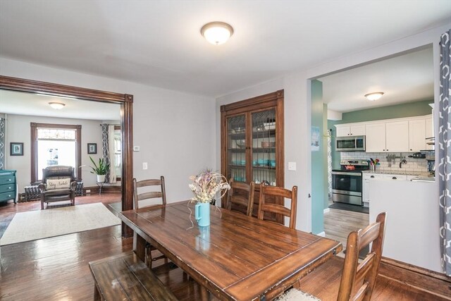 61 Fairfield Ave, Holyoke, MA 01040 - dining room with dark wood-style flooring
