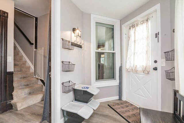 61 Fairfield Ave, Holyoke, MA 01040 - entrance foyer featuring wood finished floors, stairs, and baseboards