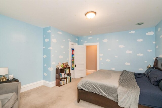 61 Fairfield Ave, Holyoke, MA 01040 - bedroom with wallpapered walls, light carpet, and baseboards
