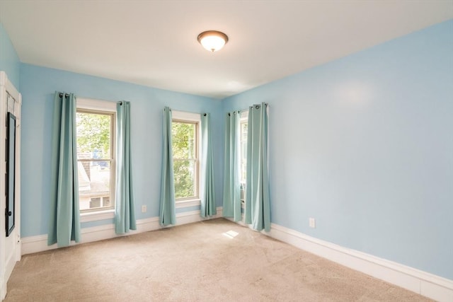 61 Fairfield Ave, Holyoke, MA 01040 - empty room featuring light carpet and baseboards