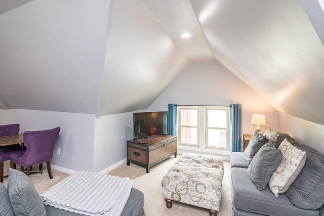 61 Fairfield Ave, Holyoke, MA 01040 - living area with light carpet, lofted ceiling, and baseboards
