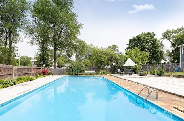 4 Charles River Rd, Medway, MA 02053 - view of swimming pool with a fenced backyard and a patio