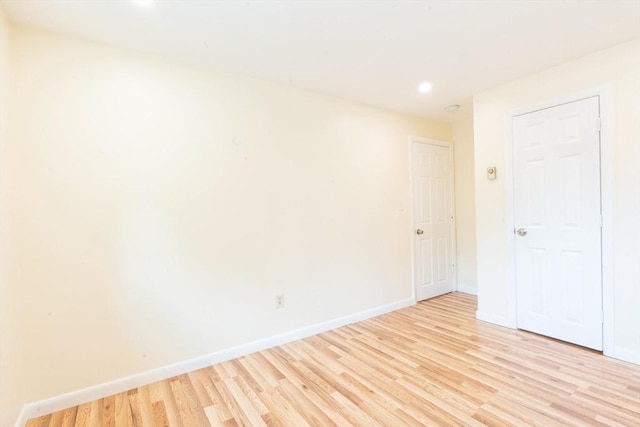 770 Cummins Hwy Unit 12, Boston, MA 02126 - unfurnished room featuring light wood-style flooring and recessed lighting