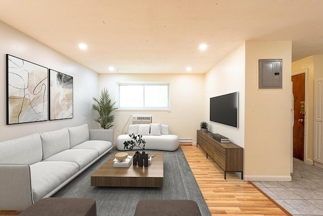 770 Cummins Hwy Unit 12, Boston, MA 02126 - living room featuring electric panel, a baseboard radiator, light wood finished floors, and recessed lighting
