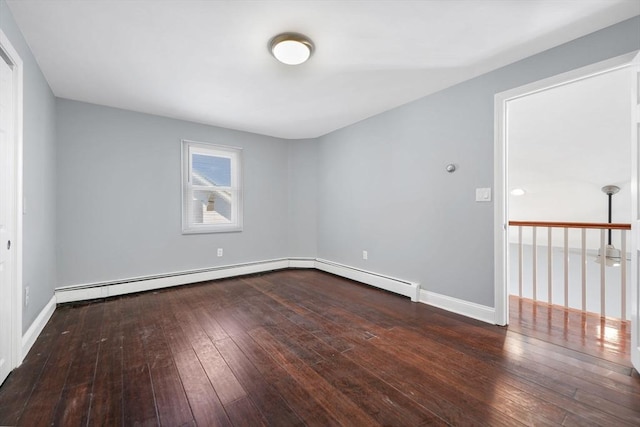 empty room featuring dark hardwood / wood-style flooring