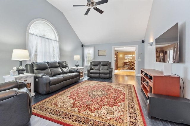 living room featuring ceiling fan, high vaulted ceiling, and wood finished floors