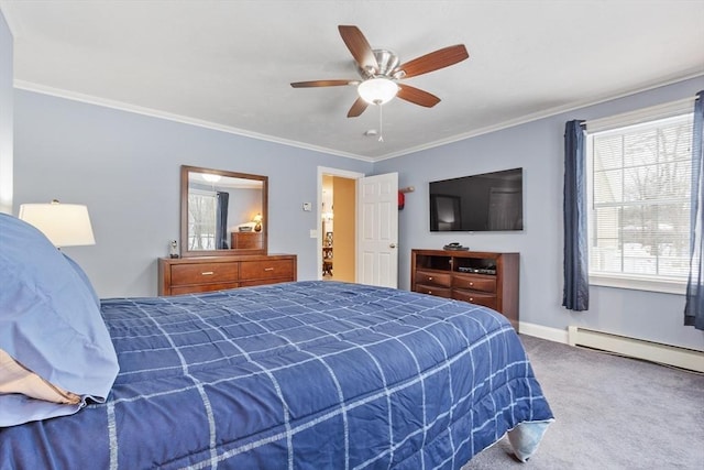 carpeted bedroom with baseboard heating, baseboards, crown molding, and a ceiling fan