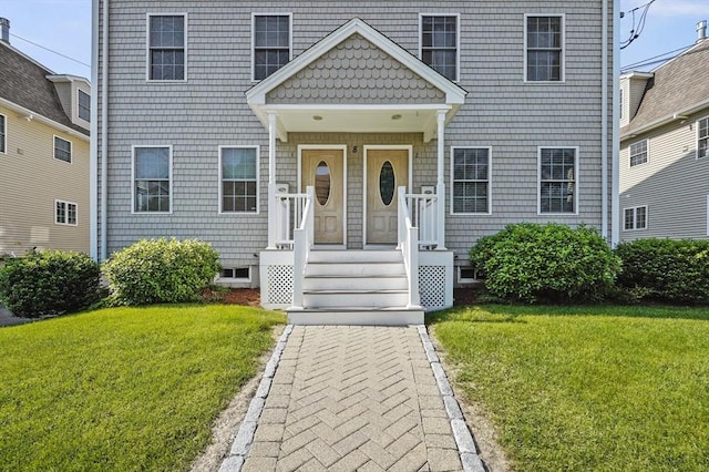 8 School St Unit 1, Waltham, MA 02452 - view of front facade with a front lawn