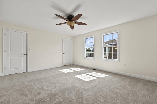 8 School St Unit 1, Waltham, MA 02452 - carpeted empty room with ceiling fan and baseboards