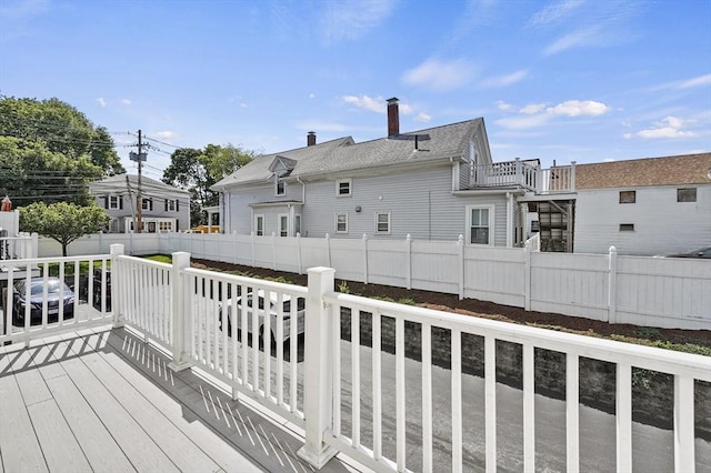 8 School St Unit 1, Waltham, MA 02452 - wooden terrace with a fenced backyard
