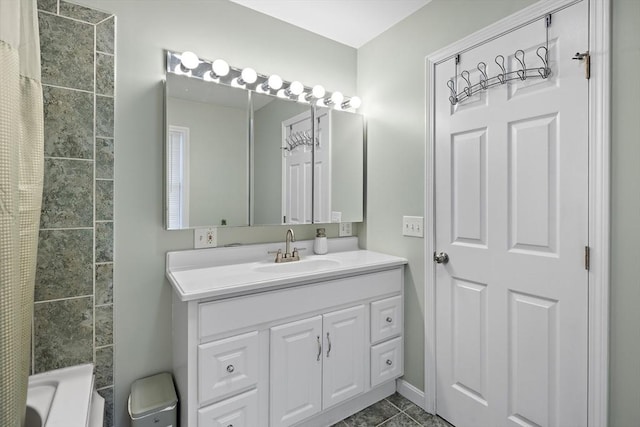 bathroom featuring shower / bath combo, vanity, and tile patterned floors