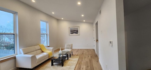 sitting room with recessed lighting, visible vents, light wood-style flooring, and baseboards