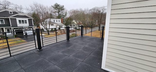 view of patio with a residential view