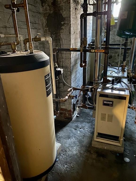 257 French St, Fall River, MA 02720 - utility room featuring water heater and a heating unit