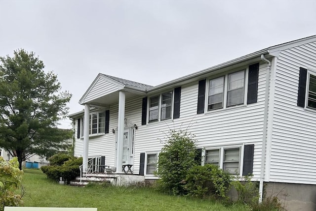 14 Rogers Cir, Braintree, MA 02184 - view of side of property featuring a yard