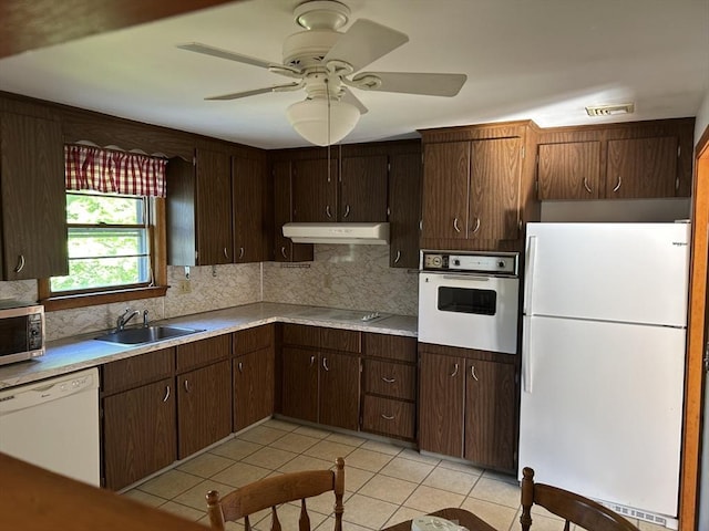 14 Rogers Cir, Braintree, MA 02184 - kitchen featuring white appliances, a sink, backsplash, and light countertops