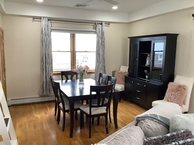 11 Dyer, Everett, MA 02149 - dining room with baseboard heating, light wood finished floors, ceiling fan, and recessed lighting