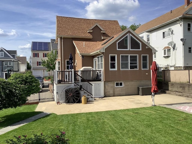 11 Dyer, Everett, MA 02149 - rear view of house with a wooden deck, stairway, a patio area, a shingled roof, and a residential view
