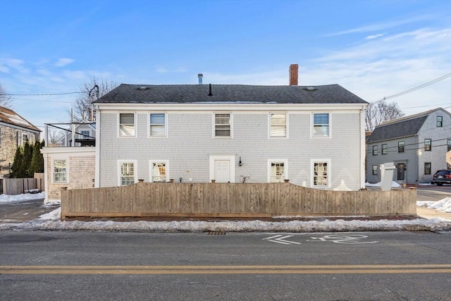 166 Water St Unit 166, Newburyport, MA 01950 - view of front facade featuring a chimney and roof with shingles