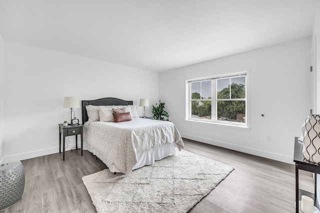 bedroom featuring hardwood / wood-style flooring