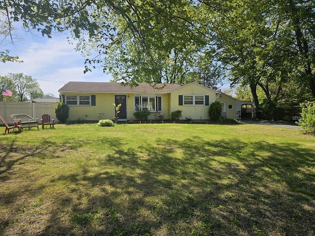 view of front facade with a carport