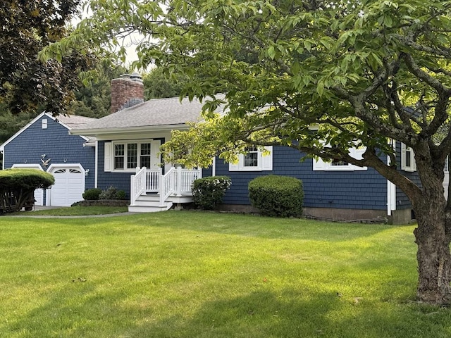 464 Church St, Raynham, MA 02767 - view of front of house featuring a garage, a chimney, and a front lawn