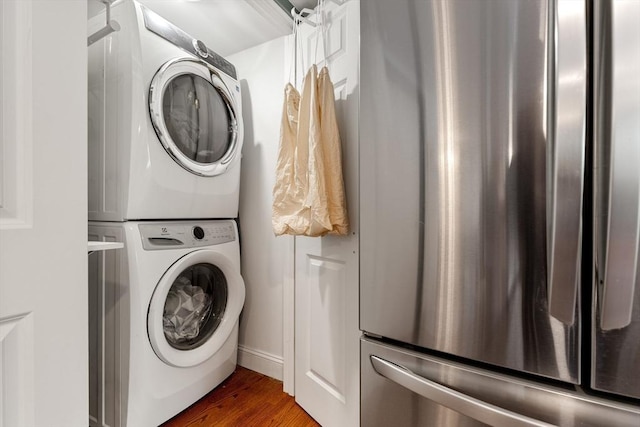 113 Bray St, Gloucester, MA 01930 - laundry room with stacked washer / drying machine and wood finished floors