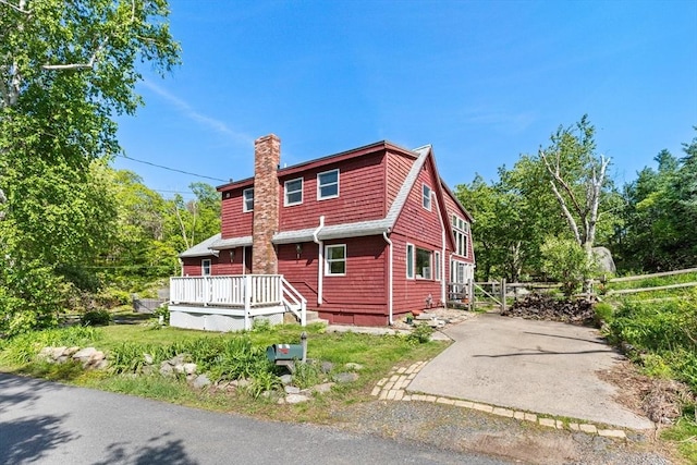 113 Bray St, Gloucester, MA 01930 - view of front of property featuring a chimney and a wooden deck