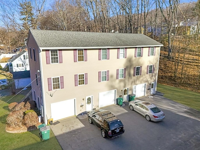 view of building exterior with a garage