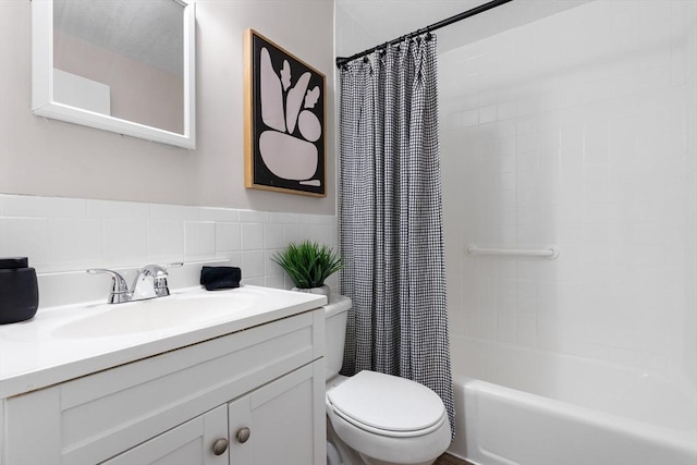 234 Low St Unit 16, Newburyport, MA 01950 - full bathroom featuring vanity, shower / tub combo with curtain, and tile walls