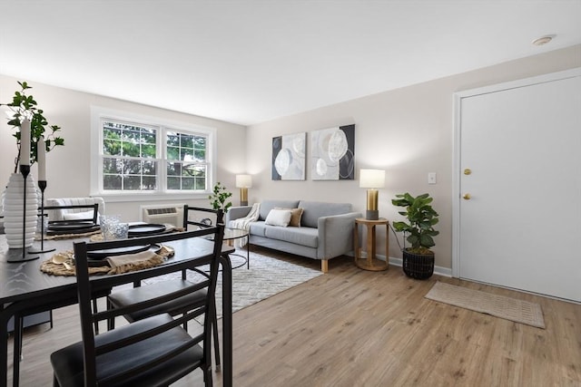 234 Low St Unit 16, Newburyport, MA 01950 - living room featuring light wood-style floors and an AC wall unit