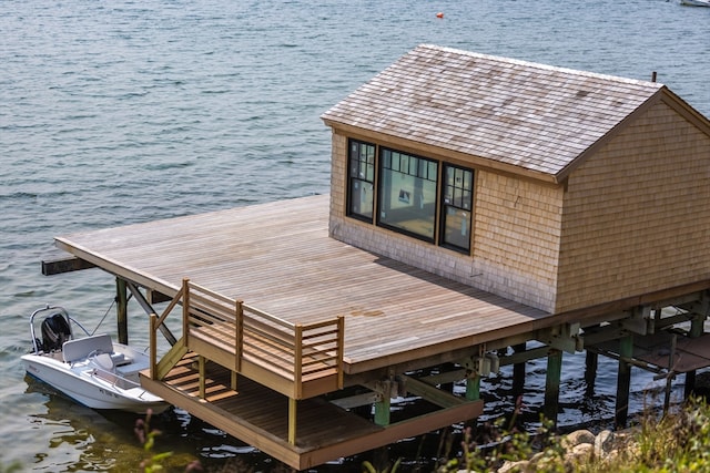 dock area with a water view