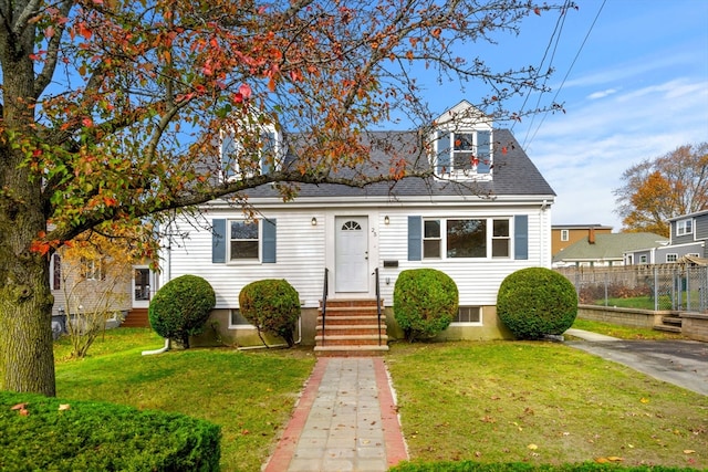 view of front of house with a front lawn