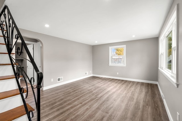 unfurnished room featuring hardwood / wood-style floors