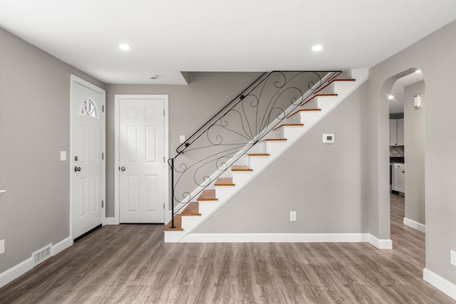 foyer entrance featuring hardwood / wood-style flooring