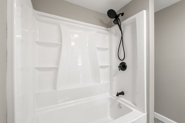 bathroom featuring  shower combination