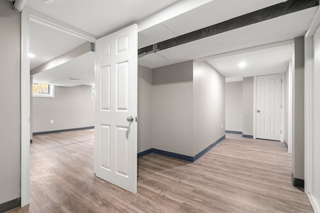 basement featuring hardwood / wood-style flooring