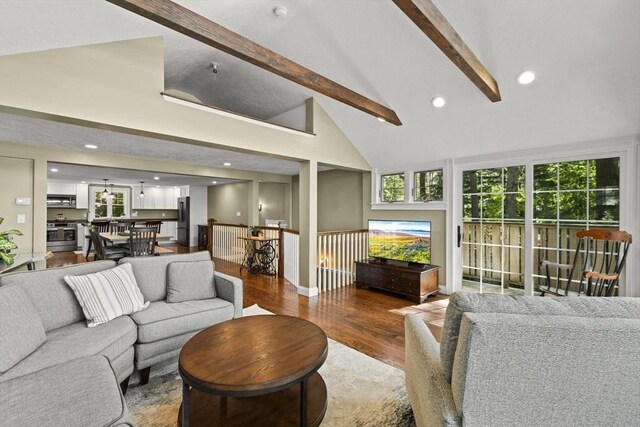 192 Furnace Ln, Pembroke, MA 02359 - living room featuring beam ceiling, wood finished floors, high vaulted ceiling, and recessed lighting