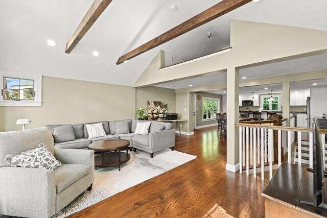 192 Furnace Ln, Pembroke, MA 02359 - living area featuring wood finished floors, beam ceiling, high vaulted ceiling, recessed lighting, and baseboards
