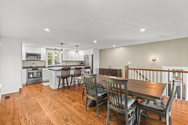 192 Furnace Ln, Pembroke, MA 02359 - dining space featuring recessed lighting and light wood-style floors