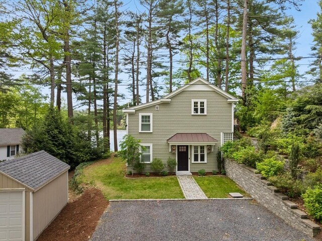 192 Furnace Ln, Pembroke, MA 02359 - traditional home featuring an outbuilding and a front lawn