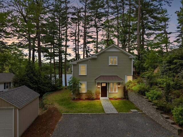 192 Furnace Ln, Pembroke, MA 02359 - traditional-style house with an outbuilding, a yard, and view of wooded area