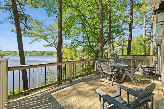 192 Furnace Ln, Pembroke, MA 02359 - wooden terrace with outdoor dining area and a water view