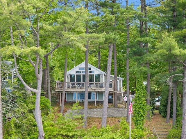 192 Furnace Ln, Pembroke, MA 02359 - rear view of house with stairway and a deck