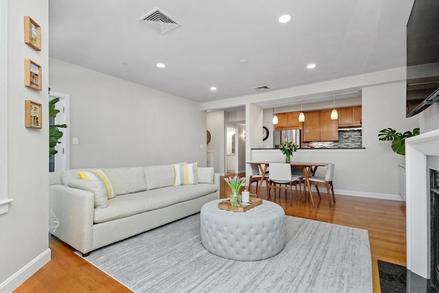 living room featuring hardwood / wood-style flooring